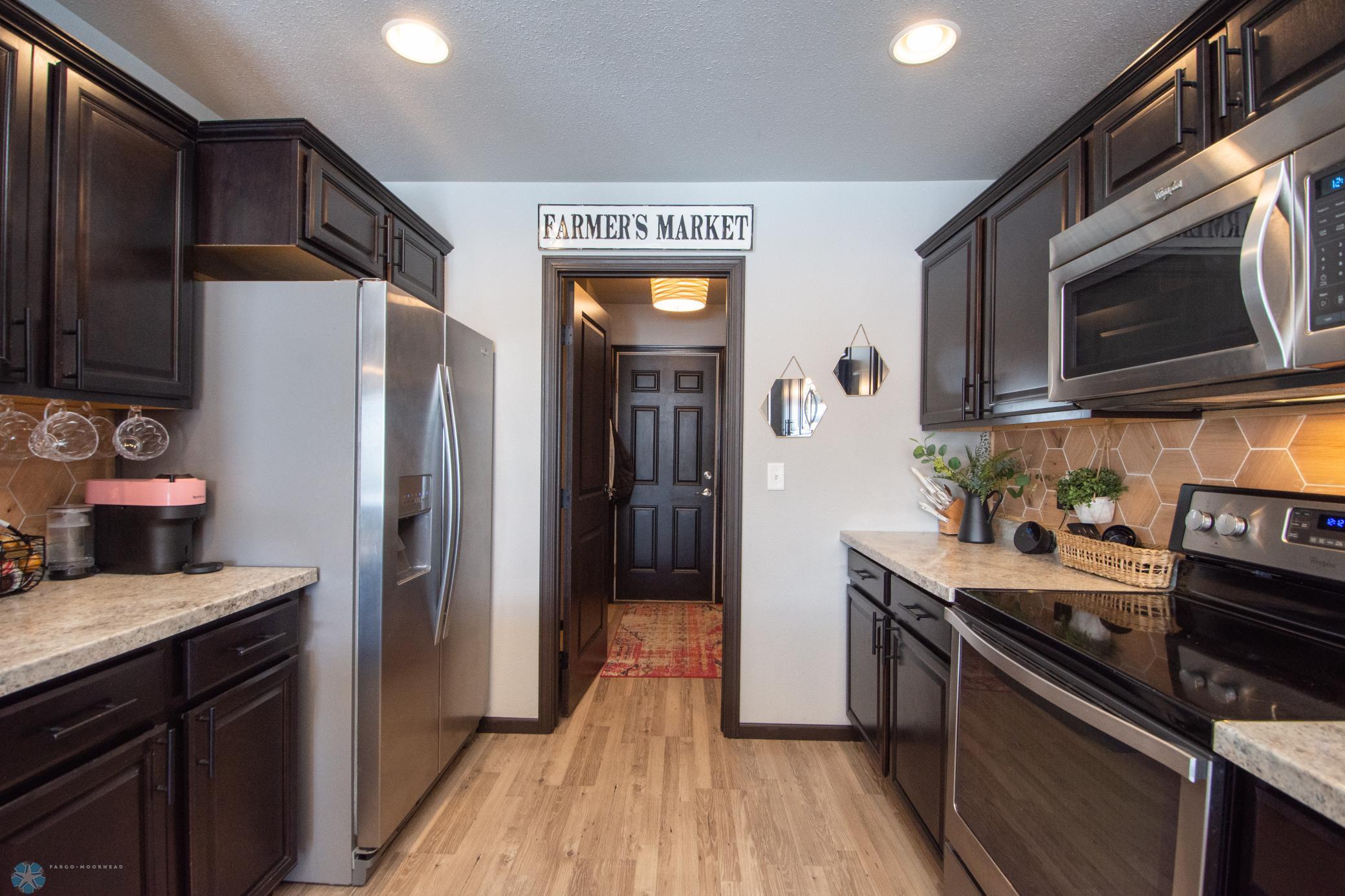 door to laundry/mudroom/half bath