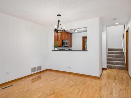 The informal dining area, with access to the kitchen makes serving meals and entertaining easy.