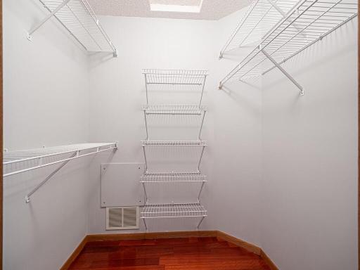 Up close shot of the primary bedroom walk-in closet.