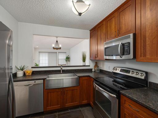 Stainless steel appliances and oversized sink.