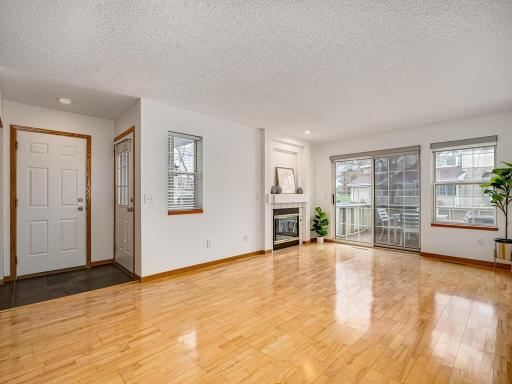 The main floor living space with beautiful wood floors, and updated LED lighting.