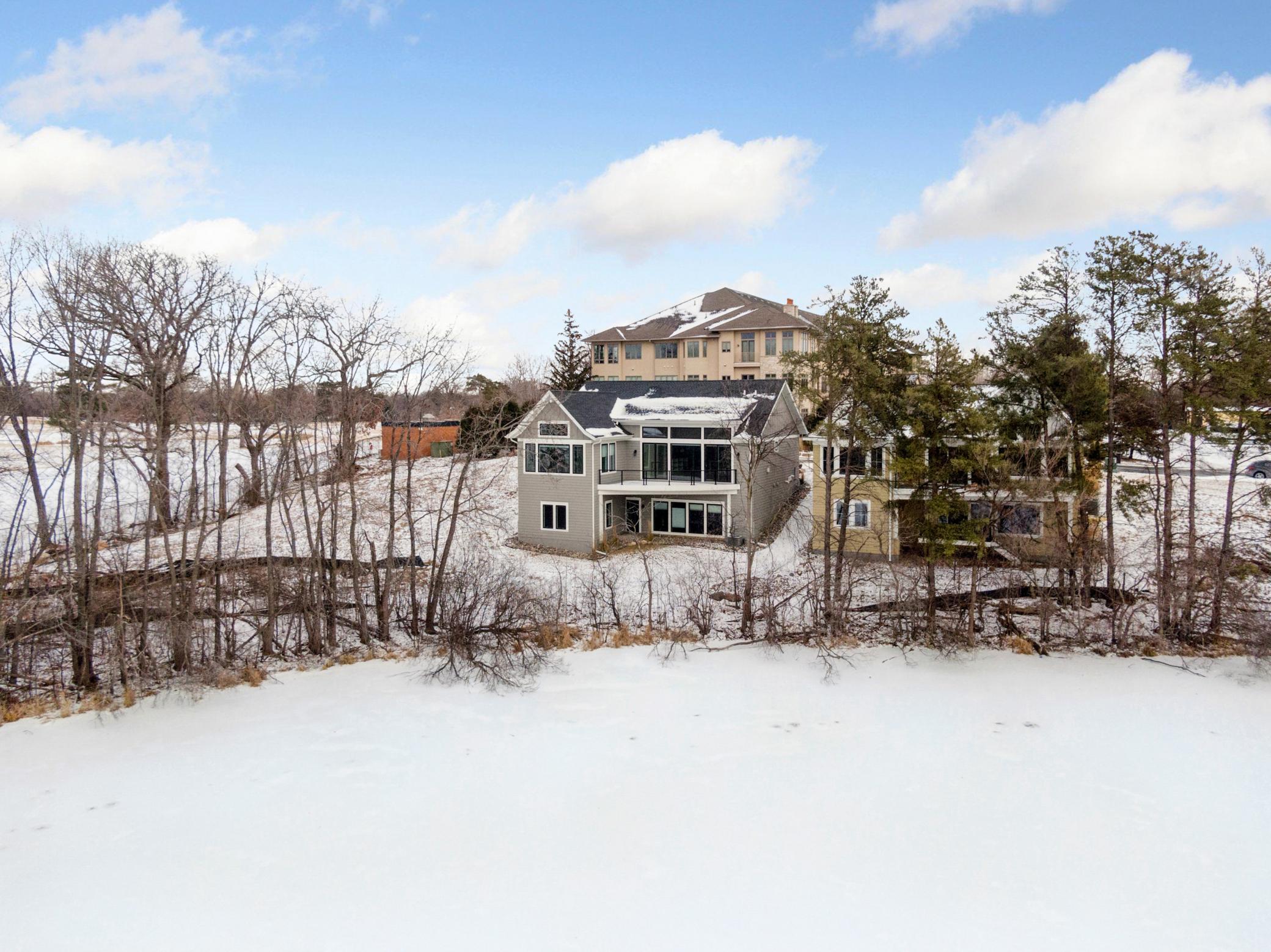 This gorgeous house overlooks a pond and the Golden Valley Country Club