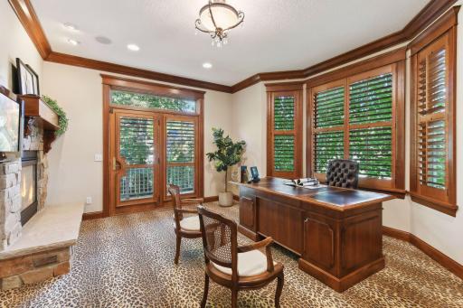 Office with Two Sided Fireplace and Deck Access