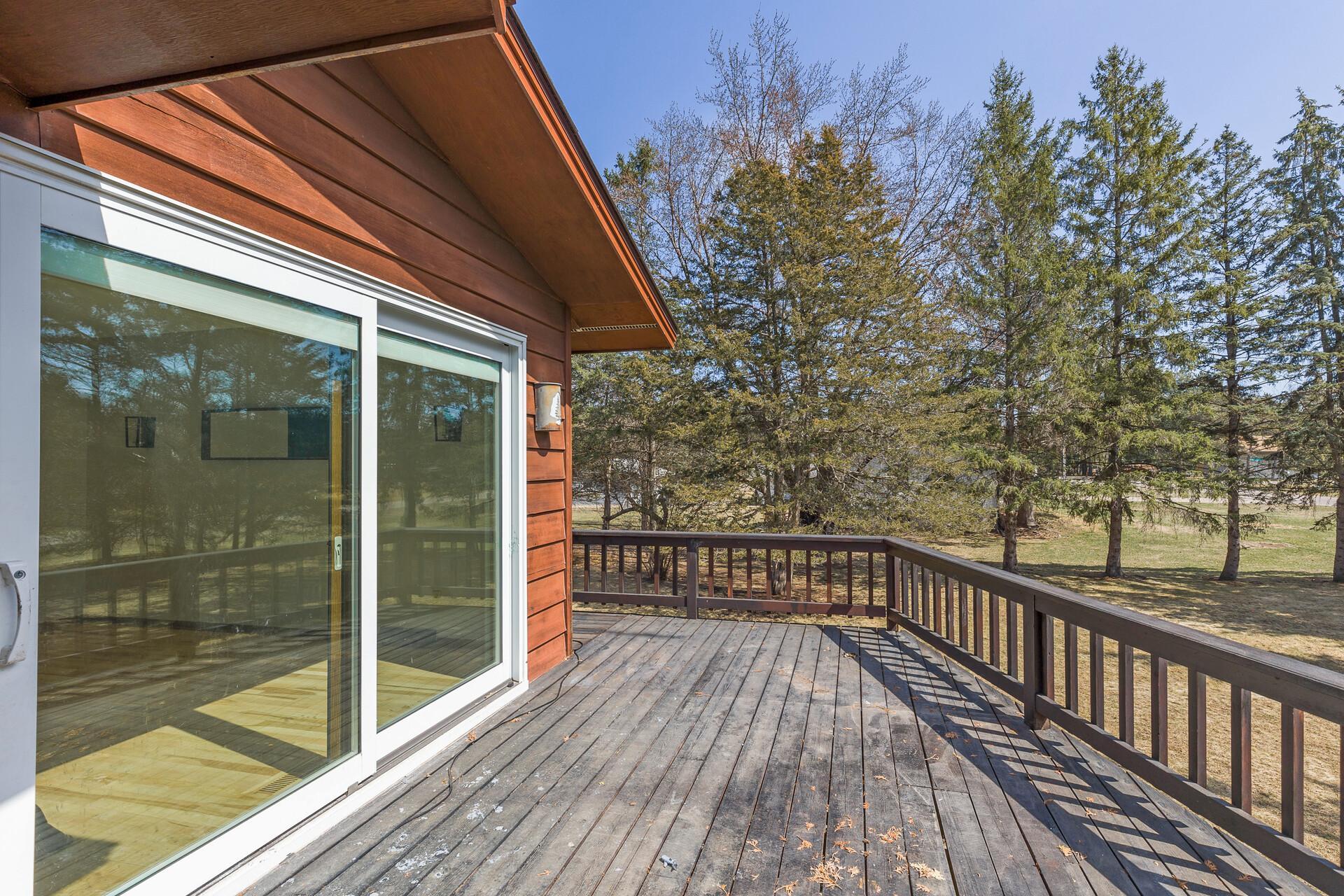 Large wrap around deck allows you to enjoy your big yard from all angles