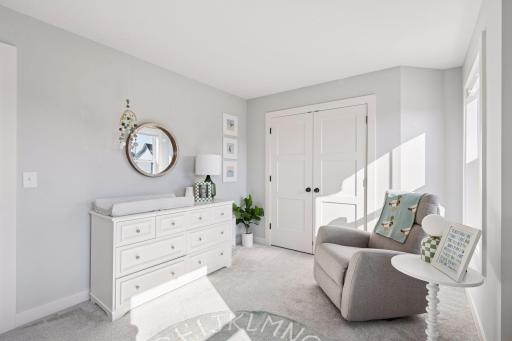Access the walk in closet through the double doors.