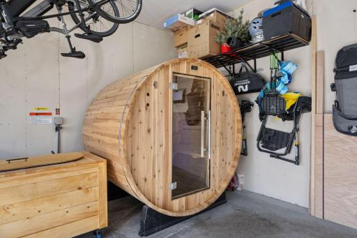In the massive 3 car garage, you will find a sauna (stays with the home!) or use the 220 outlet for an electric vehicle.