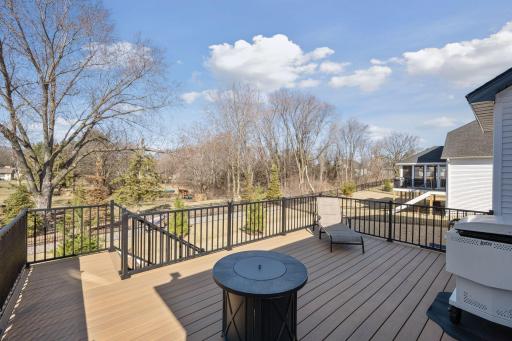 Enjoy a maintenance free composite deck with stairway access to the yard and patio below.