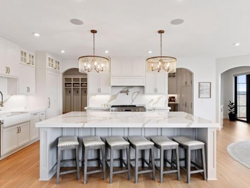 The expanisve kitchen island offers plenty of space to create your favorite meal.