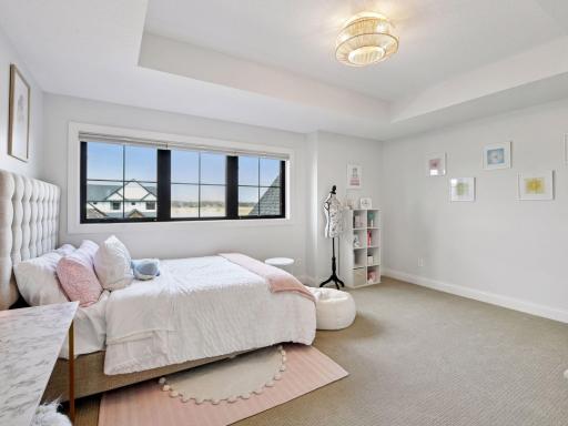 The second of three bedrooms upstairs - all three bedrooms have private en suite bathrooms and walk-in closets!
