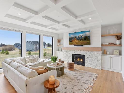 Floor-to-ceiling windows bathes the main floor in natural light.