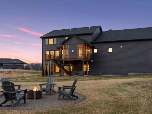 Outside enjoy those MN summer nights around the fire with this custom paver fire pit area.