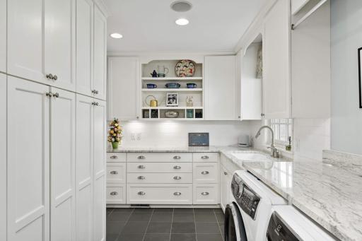 The perfect pantry/mudroom/Laundry room off the garage