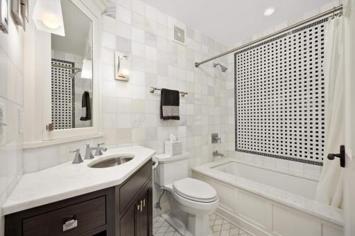 One of 5 bathrooms - beautiful tile work plus heated floors!