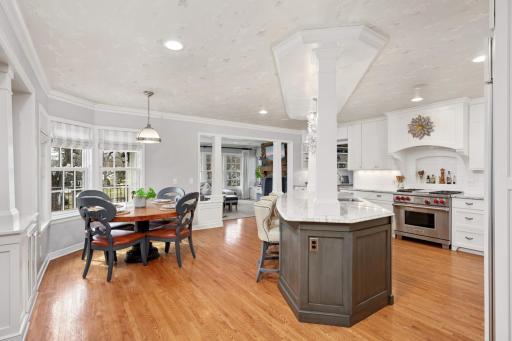 Open kitchen concept with large island and eat in area. Opens to front room and deck.