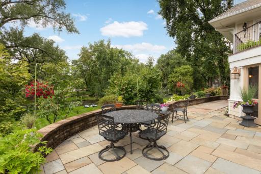 Patio overlooks the creek and property.