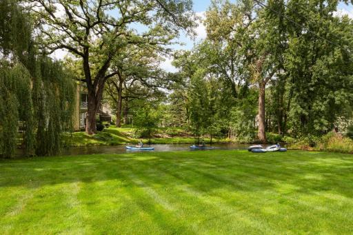 One of the largest flat backyards on the creek! Allows for perfect access to creek and wonderful recreation area.