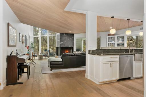 Newly updated with white oak plan floors, new windows and updated kitchen