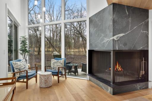 Wonderful wood burning fireplace with custom stone surround