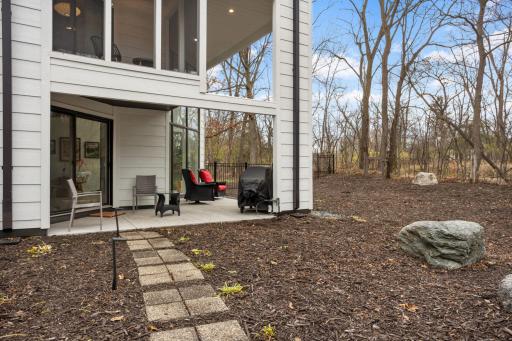 See upper level master screen porch with main level covered patio