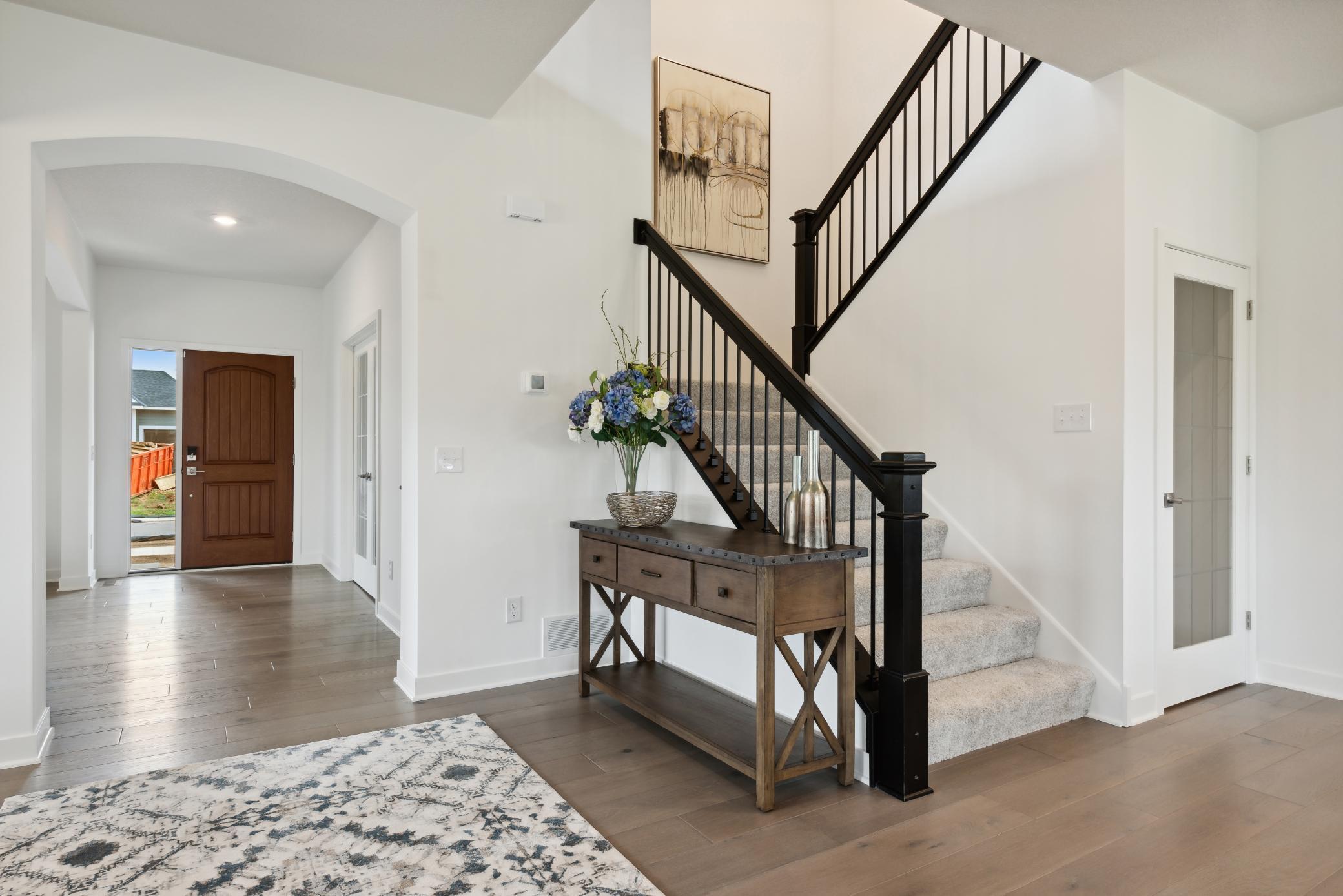 (Photo of model home, finishes will vary) The foyer of the home.