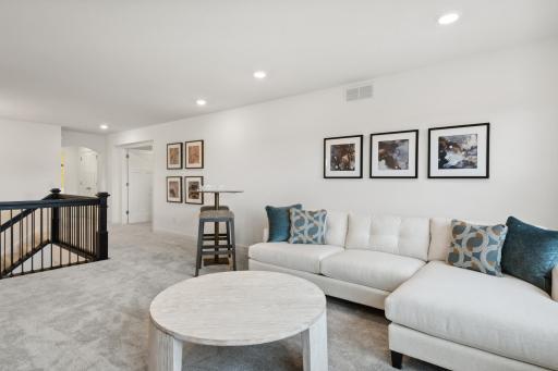 (Photo of model home, finishes will vary) Found upstairs is a large loft that can easily operate as another common area to watch movies, play games and hang out with friends.