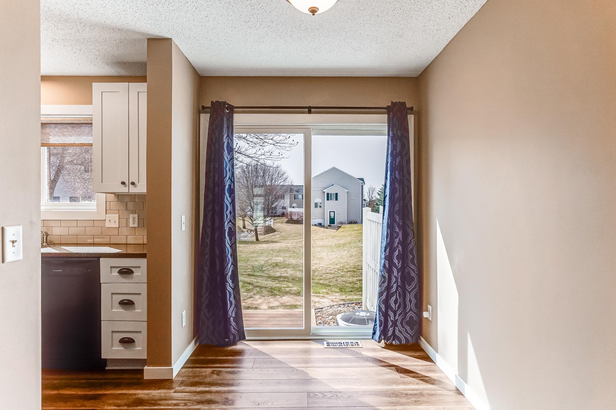 Patio door to the back yard and patio.