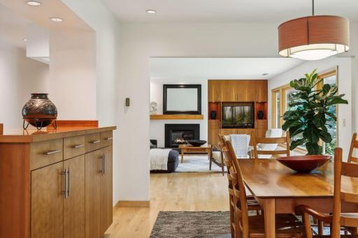 The half wall over the dining room cabinets to the hallway and foyer adds to the gracious, open environment.