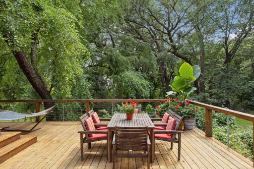Dine al-fresco in complete tranquility, surrounded by lush landscaping.