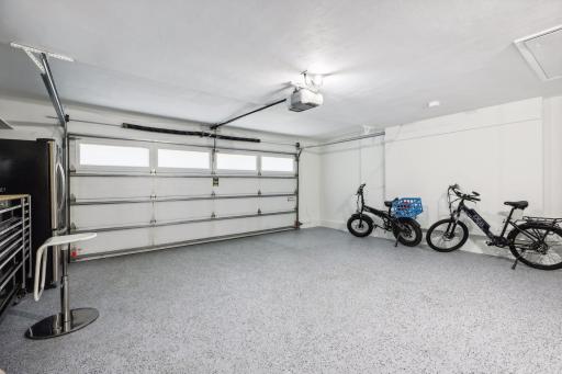 Your cars will be protected in the attached two car garage, with epoxy flooring.