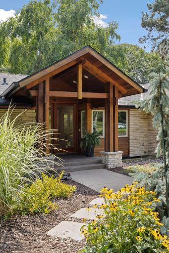 The covered entryway will protect your arriving guests from inclement weather.