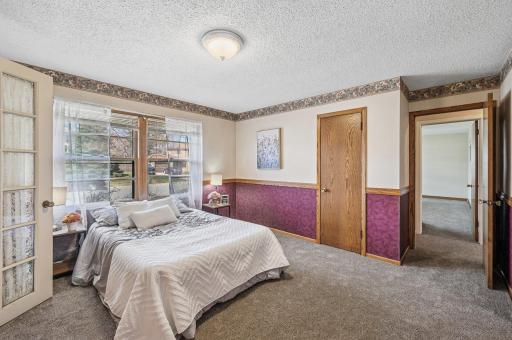 You could add a wall on either side for more privacy. This is the smaller of the two bedrooms and is still generous in size.