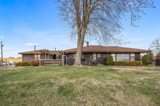 Back side of the home faces the football field and has a nice patio. You will enjoy games from your yard!