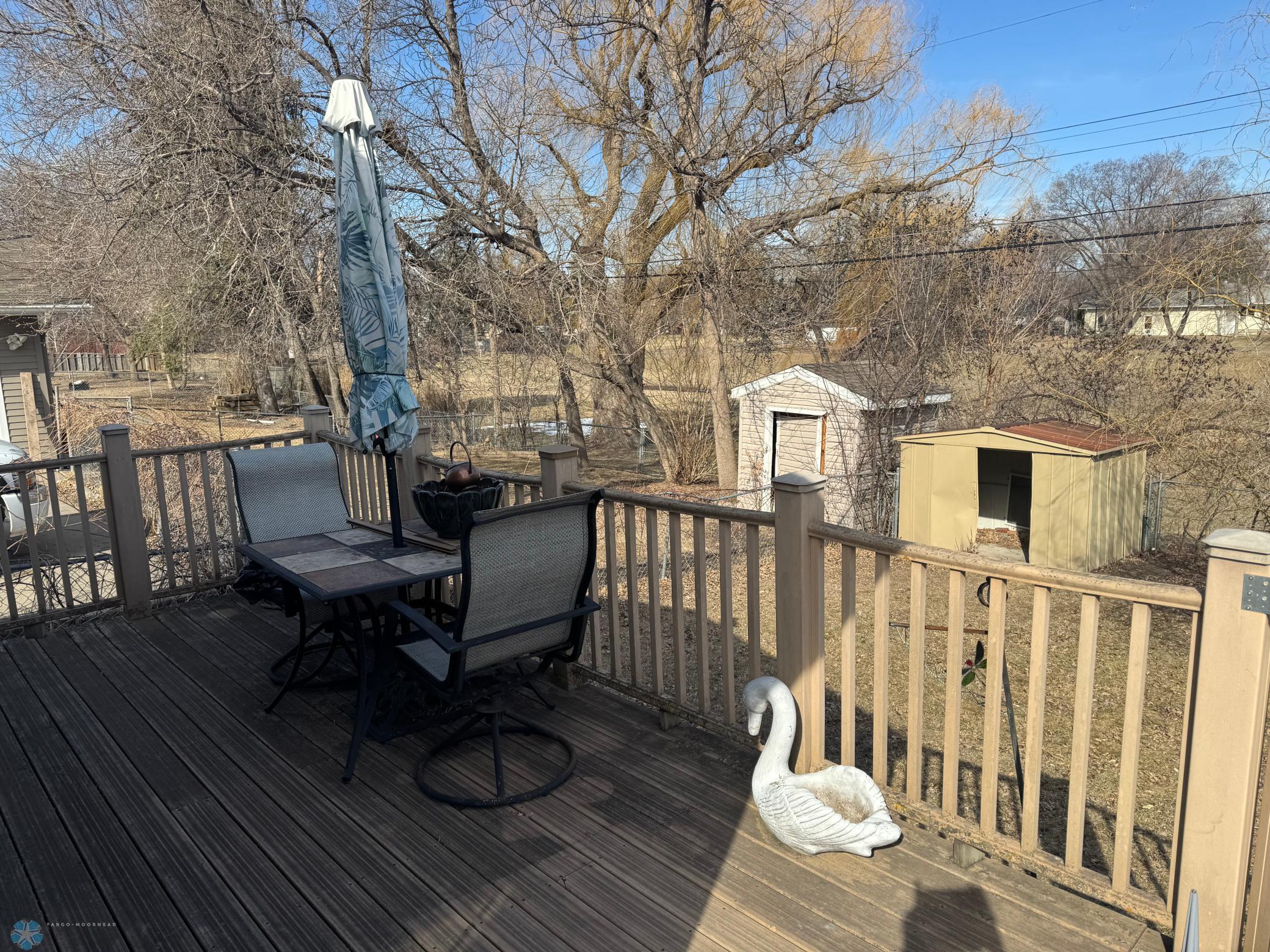 deck & shed on right