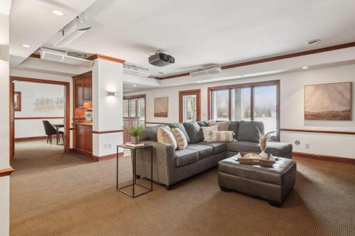 Welcome to the ultimate in family living and entertainment! This expansive lower level features a cozy family room, additional bedroom, den, workout room, bar area perfect for a pool table, and a walkout room. Walkout to your lake side yard.