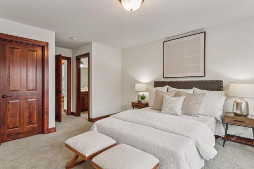 Each of the upper-level bedrooms offers generous closet space, providing ample storage and organization in these beautifully designed retreats.