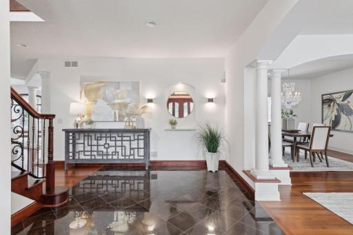 Custom two-story design, where luxury meets comfort. The craftsmanship blending natural woods and stone tiling is pure bliss.