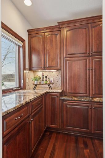Stunning kitchen cabinetry blends functionality with luxury, offering both ample storage and sophisticated design. Every detail is crafted for a seamless, high-end cooking experience.