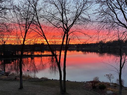 Tranquil cul-de-sac living with stunning Parkers Lake views.