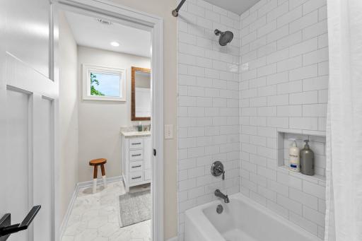 Completely remodeled upstairs bath with tiled tub/shower upstairs bath