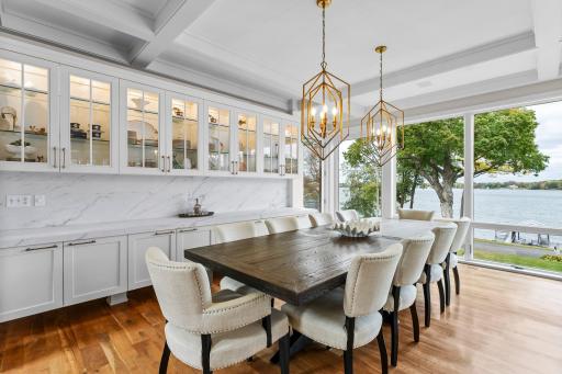 Stunning dining area with updated porcelain buffet and new lighting