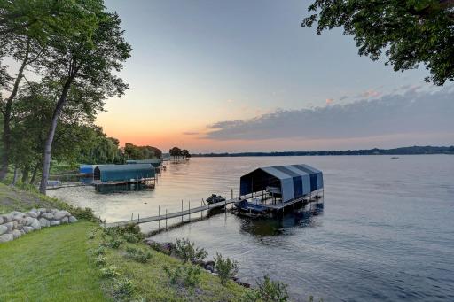 50 year warranty on dock and 1 year old boat cover. 6 1/2 feet deep at end of dock.