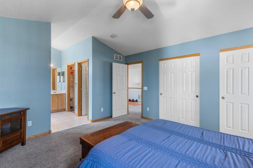 Primary with his and herâs closets and a walk in closet off of the bathroom