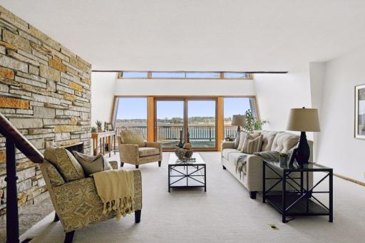 Living room with stunning lake views and sliding doors