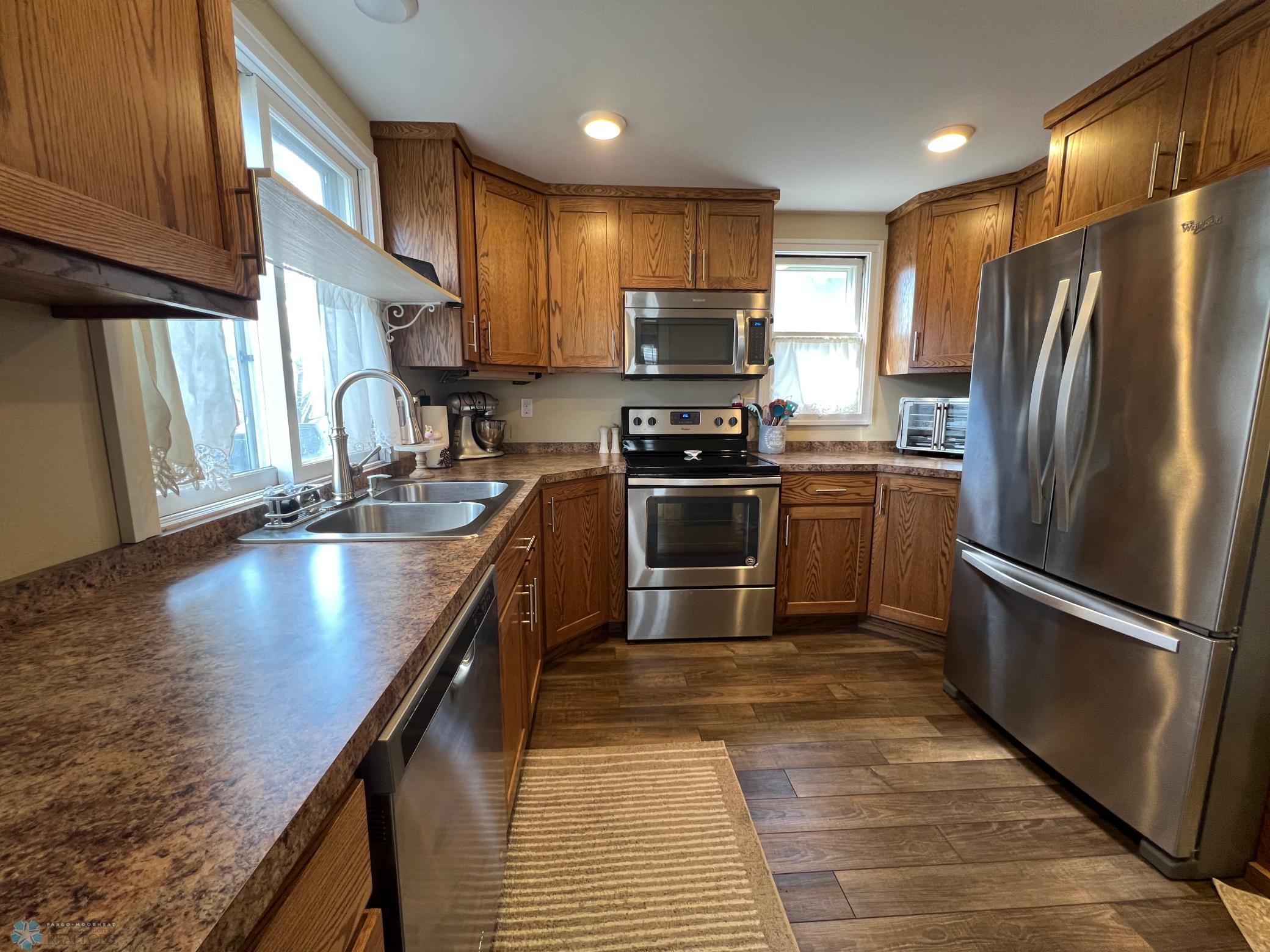 Kitchen remodeled in 2018 - new cabinets, countertops, appliances, and flooring