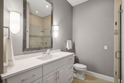 En-suite 3/4 bath in the secondary bedroom