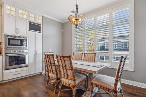 Casual dining area off the kitchen with access to balcony