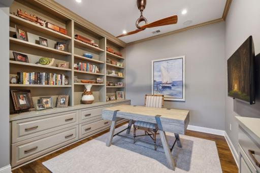 Designated office space with custom built-ins to keep things organized