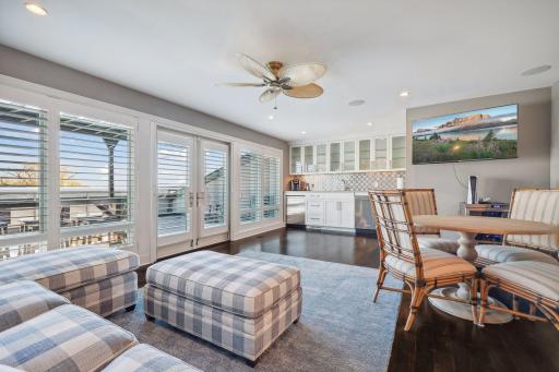 The upper level loft is a separate area for casual gatherings or an additional bedroom