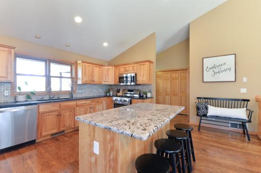 Huge kitchen with granite counters and stainless appliances