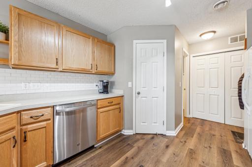 Kitchen w walk-in pantry and plenty of cabinets and counter space